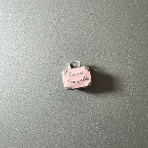 SOLD ON MERC Pandora Love Travels charm